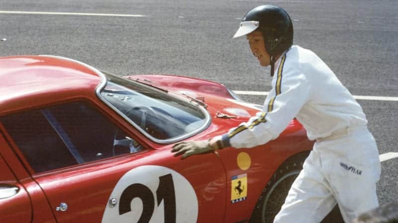 Jochen Rindt walks towards the no21 Ferrari in the pits during the 1965 Le Mans 24 Hours