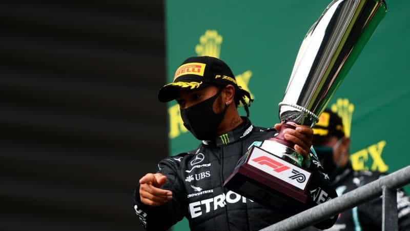 Lewis Hamilton lifts the trophy after victory in the 2020 F1 Belgian Grand Prix