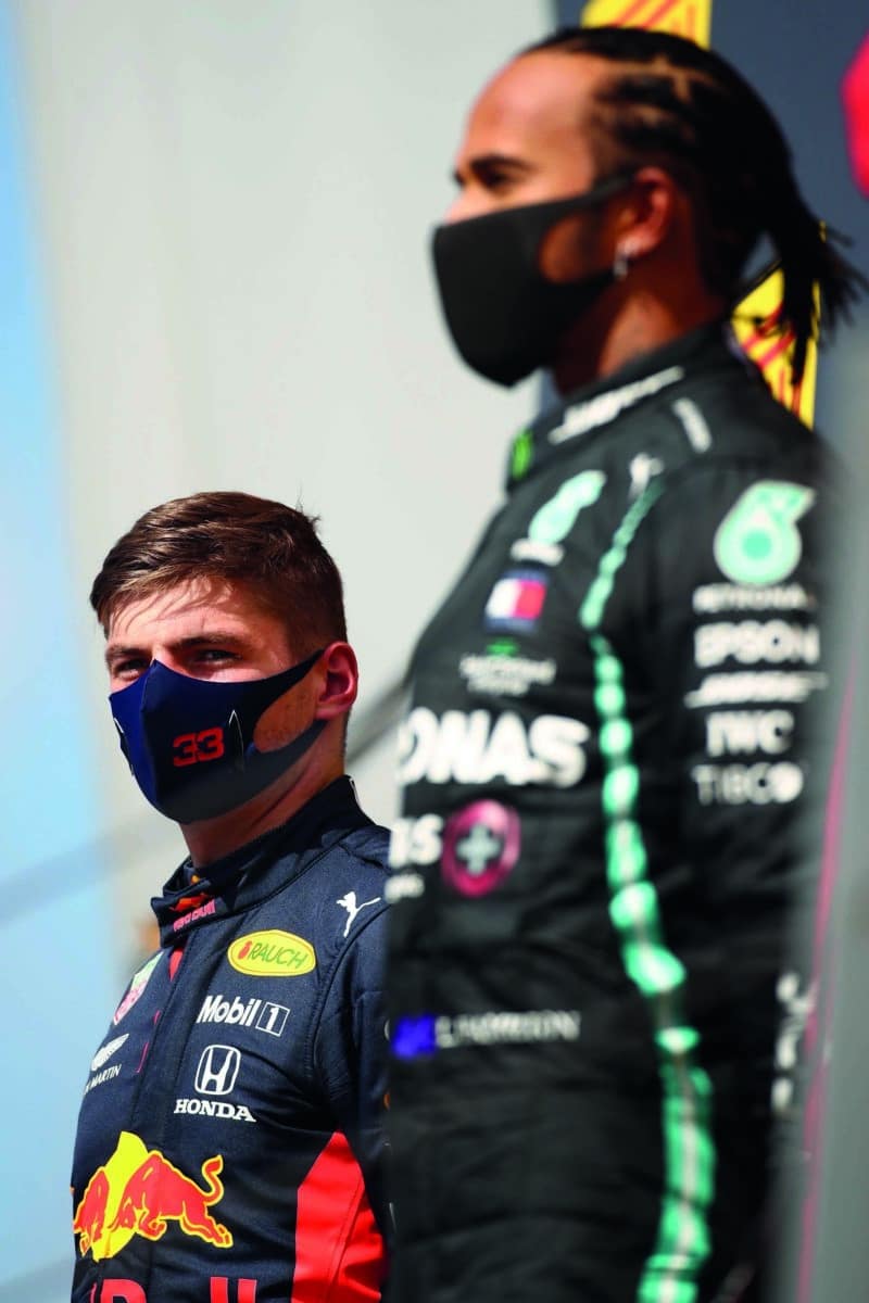 Lewis-Hamilton-on-the-podium-next-to-Max-Verstappen-after-winning-the-2020-Spanish-Grand-Prix-at-Barcelona