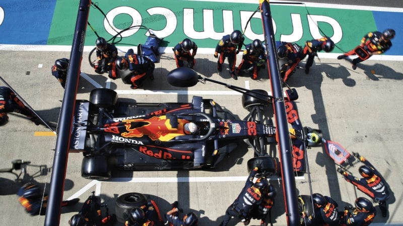 Max Verstappen's Red Bull mid-pitstop during the 2020 F1 British Grand Prix at Silverstone