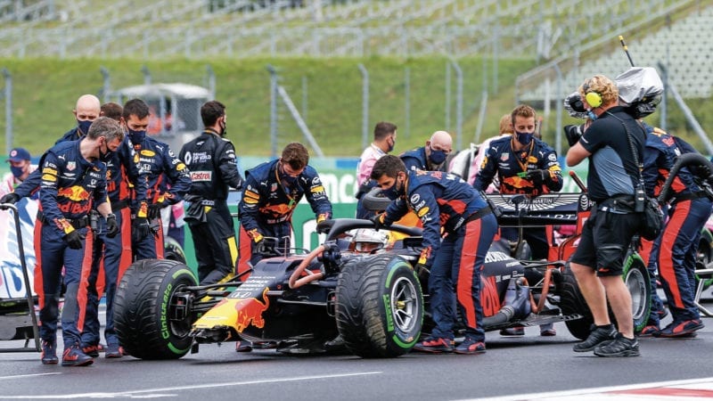 Max Verstappen's damaged car is pushed to the grid ahead of the 2020 Hungarian Grand Prix