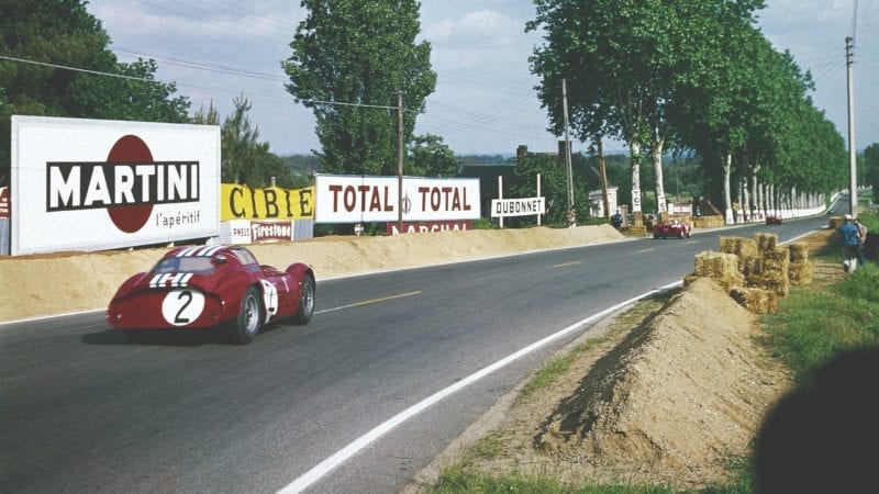The André Simon and Lloyd Casner Maserati T. 151 roars out of Tertre Rouge onto the Mulsanne Straight in the 1963 le Mans 24 Hour race