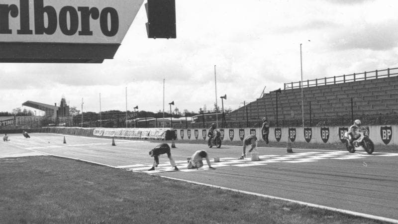 Painting the grid lines at the 1982 French motorcycle grand prix