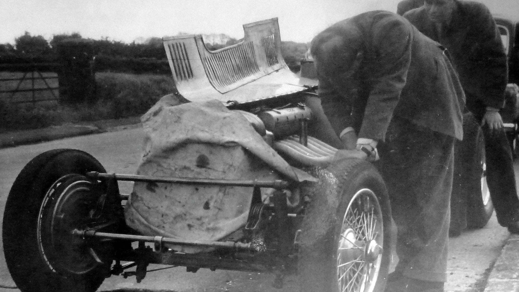 Ron Flockhart and team change the plugs on his ERA on his way to the 1952 Ulster Trophy