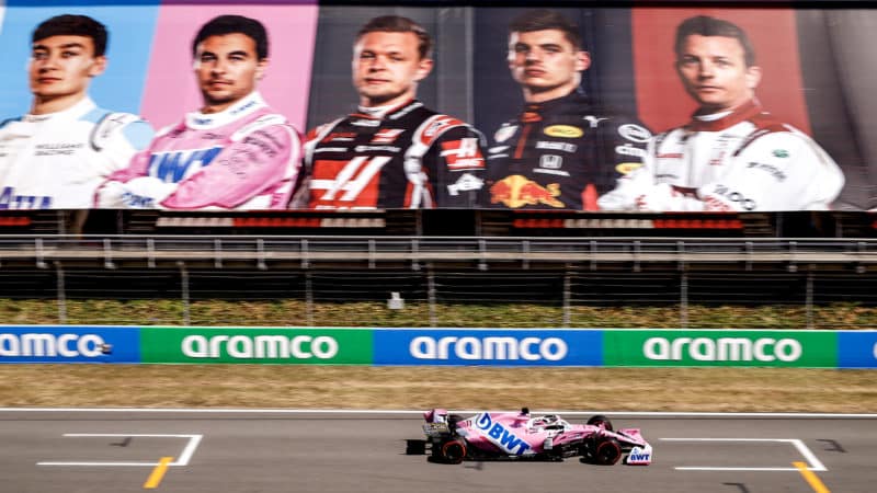 Sergio Perez during drives past images of 2020 F1 drivers in the grandstands during qualifying for the F1 Spanish Grand Prix