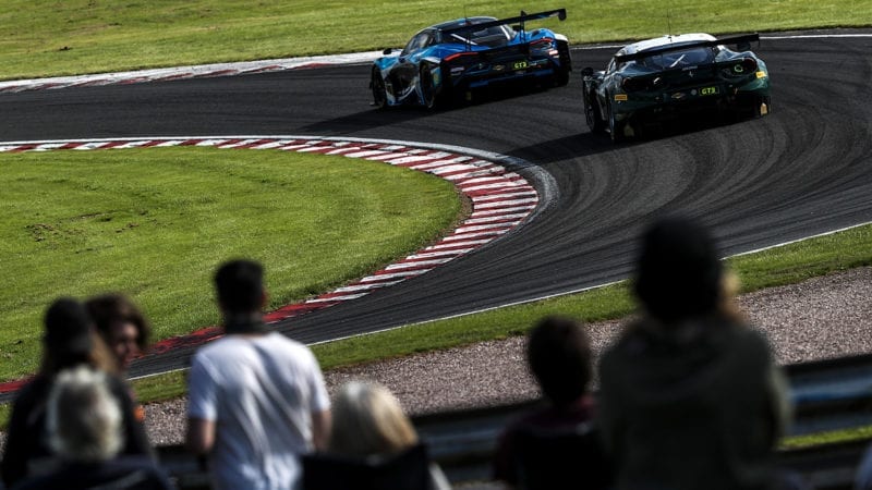 Spectators watch the British GT cars at Oulton Park in 2020