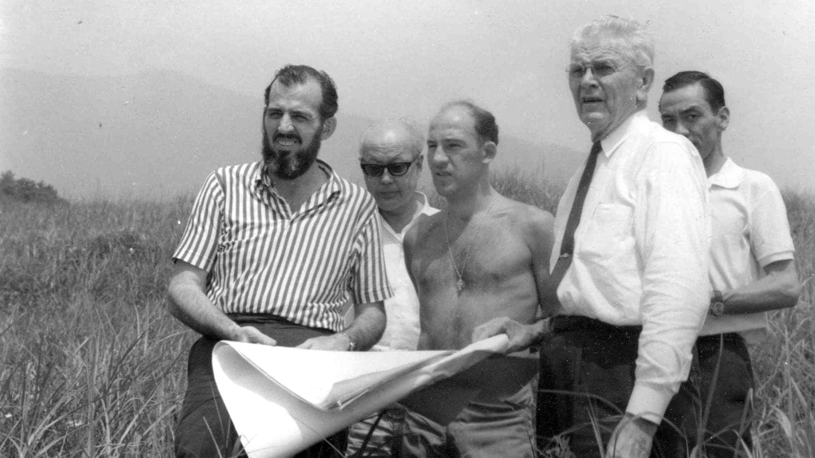 Stirling Moss and Don Nichols in Japan at the site of the proposed Fuji Speedway