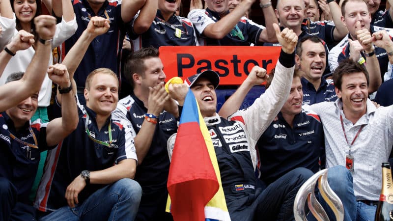The Williams team celebrate with Pastor Maldonado after winning the 2012 F1 Spanish Grand Prix