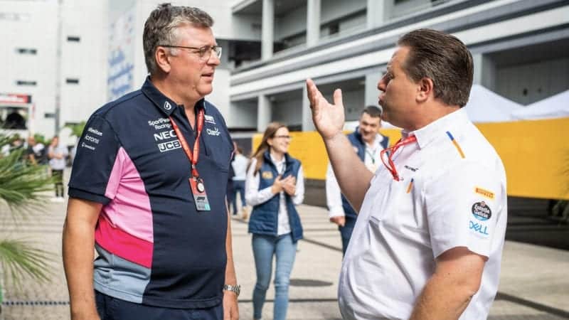 Zak Brown with Otmar Szafnauer at the 2019 Russian Grand Prix in Sochi