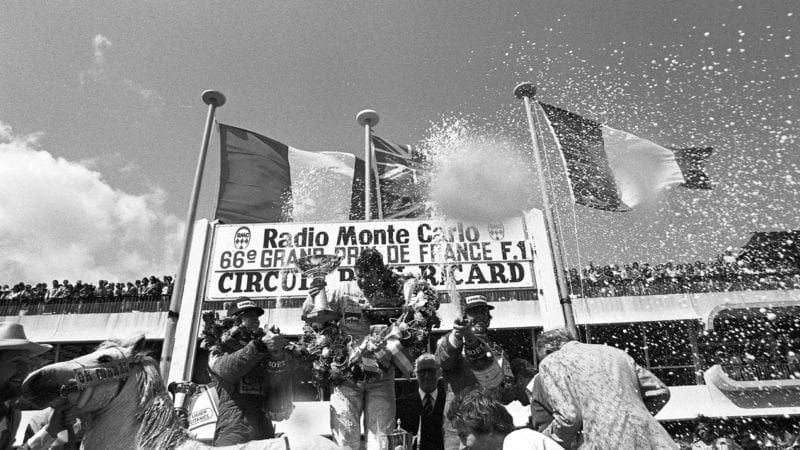 Alan Jones, Didier Pironi and Jacques Laffite on the podium at Paul Ricard after the 1980 F1 French Grand Prix
