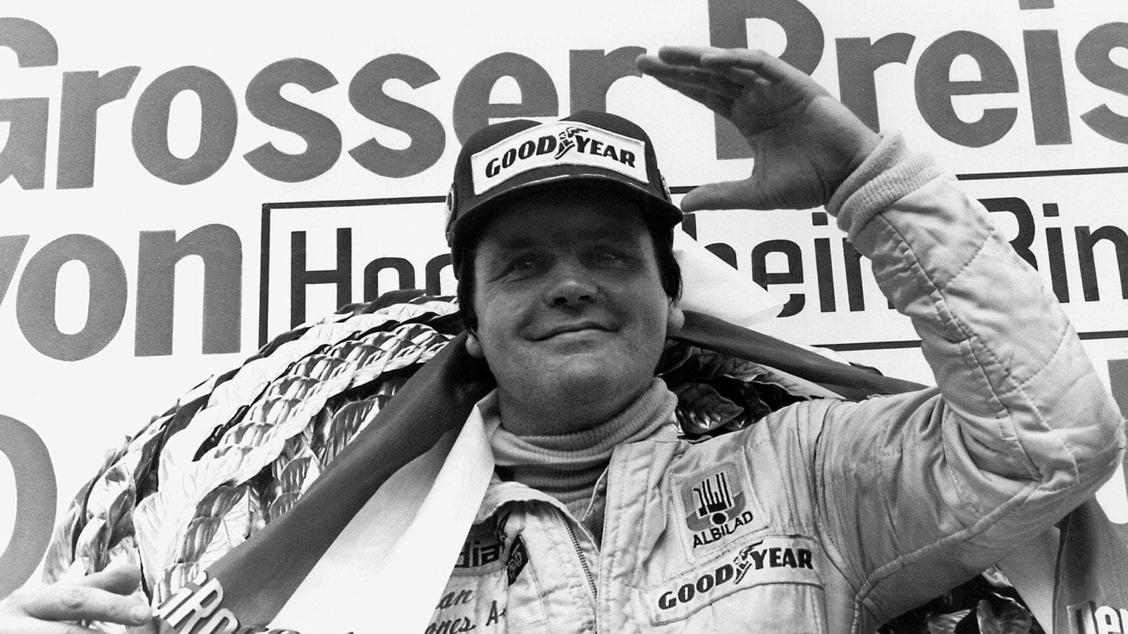 Alan Jones on the podium for Williams after the 1979 F1 German Grand prix