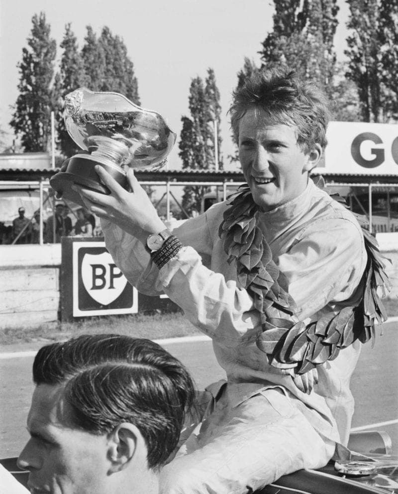 German racing driver Jochen Rindt holding his trophy after winning the 'London Trophy' Formula 2 race at the Crystal Palace circuit, UK, 18th May 1964.