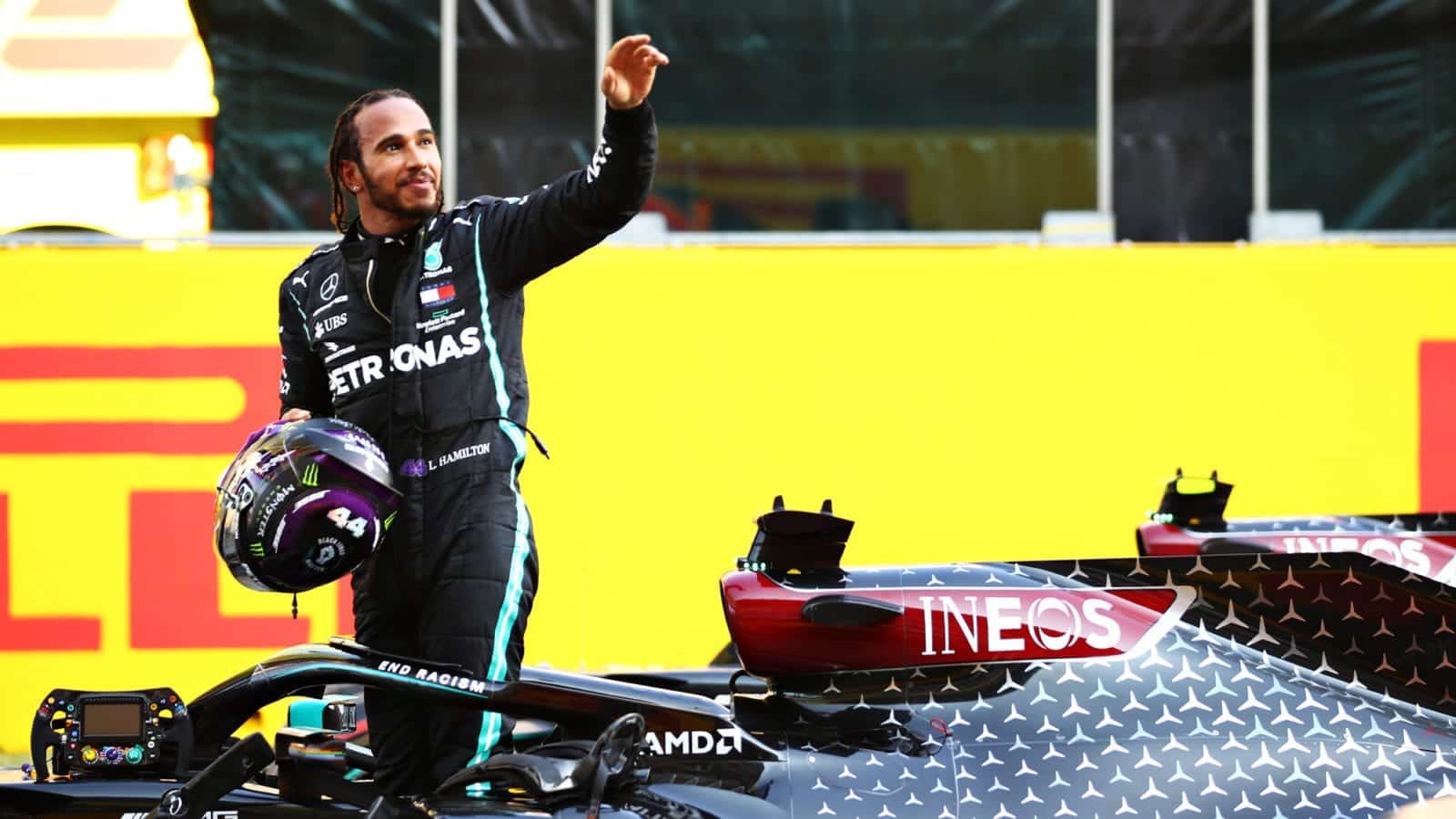 Lewis Hamilton raises his arm after winning the 2020 Tuscan Grand Prix at Mugello