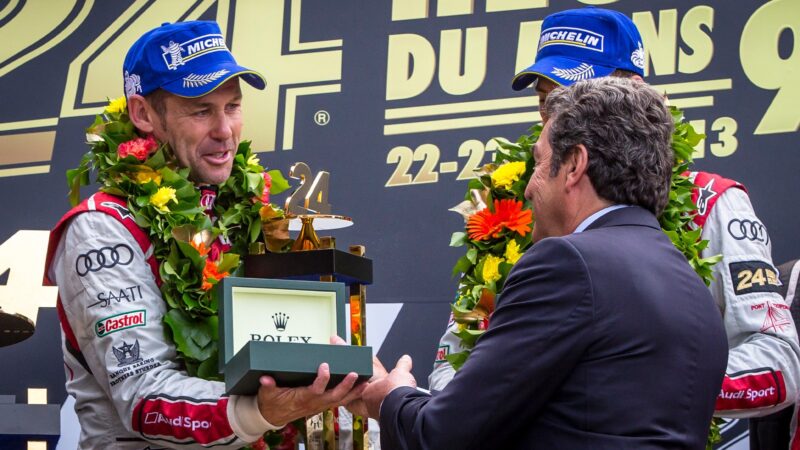 Tom Kristensen on the podium at Le Mans