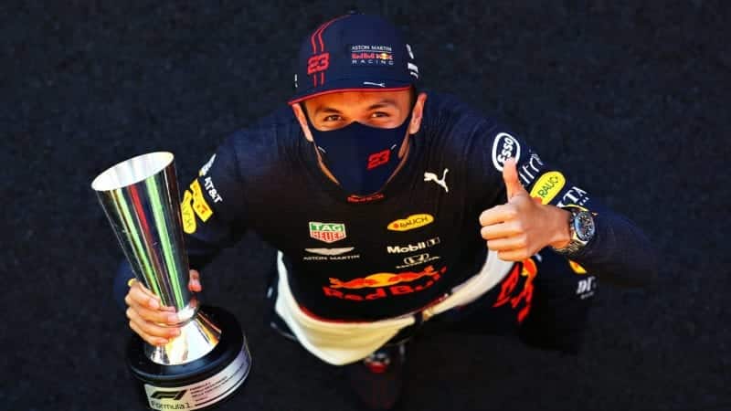 Alex Albon holds his trophy after finishing in third place in the 2020 F1 Tuscan Grand Prix at Mugello