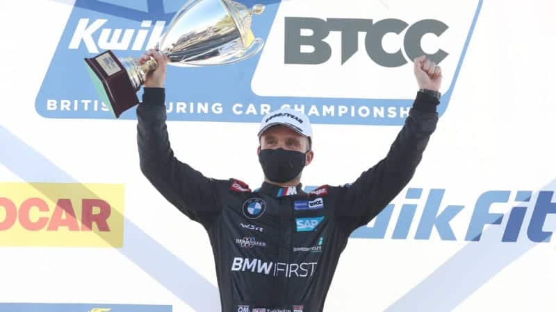 Colin Turkington celebrates victory at Snetterton on the BTCC podium in 2020