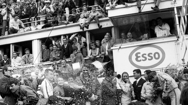 Dan Gurney spraying champagne at Le Mans