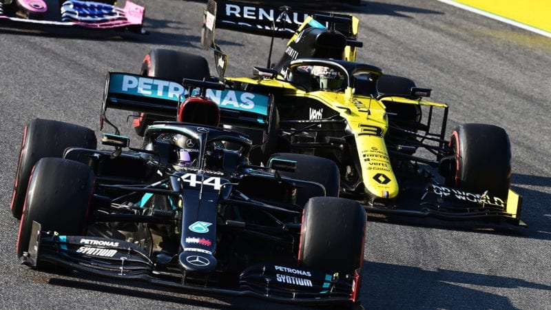 Lewis Hamilton in the Mercedes leads Daniel Ricciardo's Renault