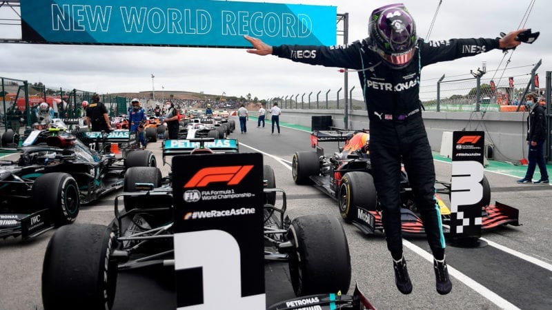 Lewis Hamilton leaps out of his Mercedes after securing a record 92nd victory in Portimao at the 2020 Portuguese Grand Prix