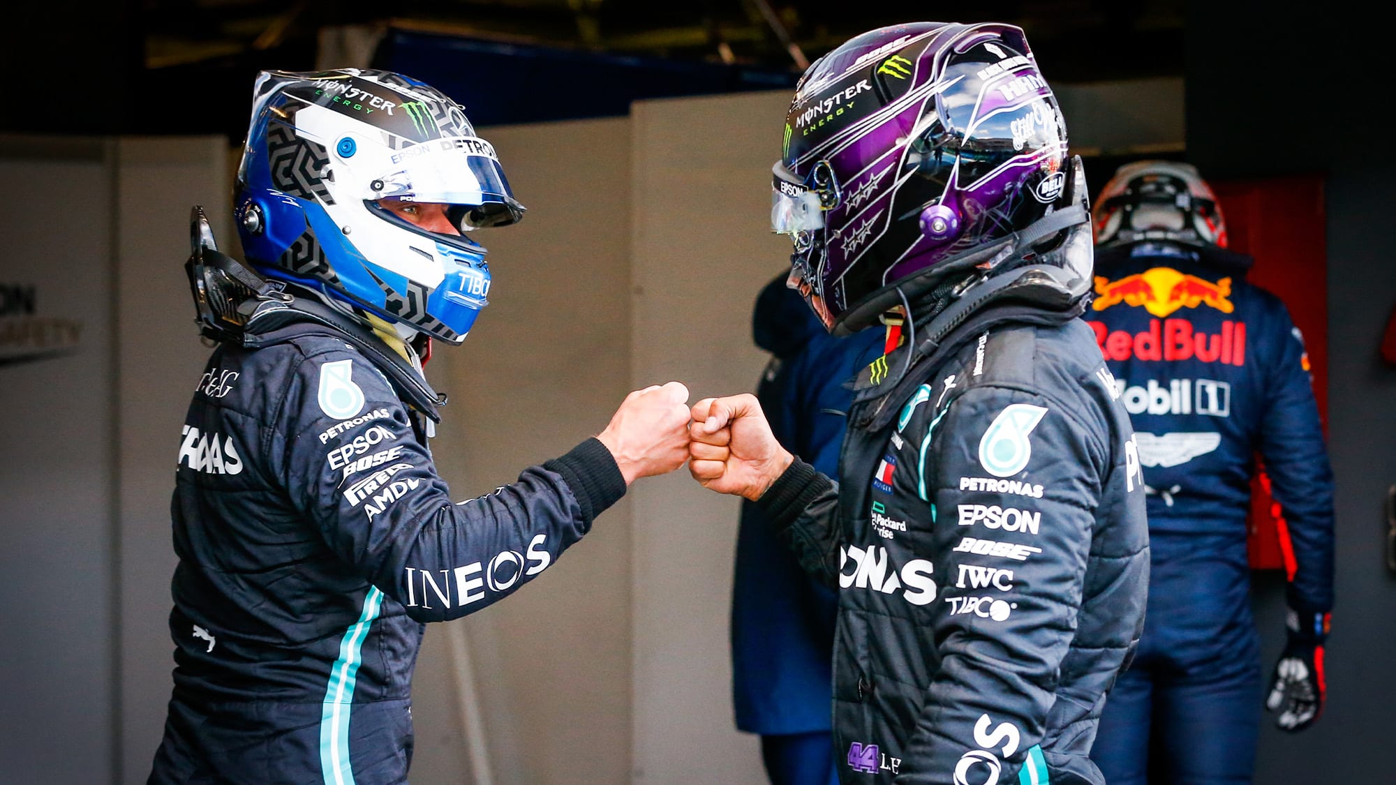 Valtteri Bottas and Lewis Hamilton bump fists after qualifying 1-2 at the Nurburgring for the 2020 F1 Eifel Grand Prix