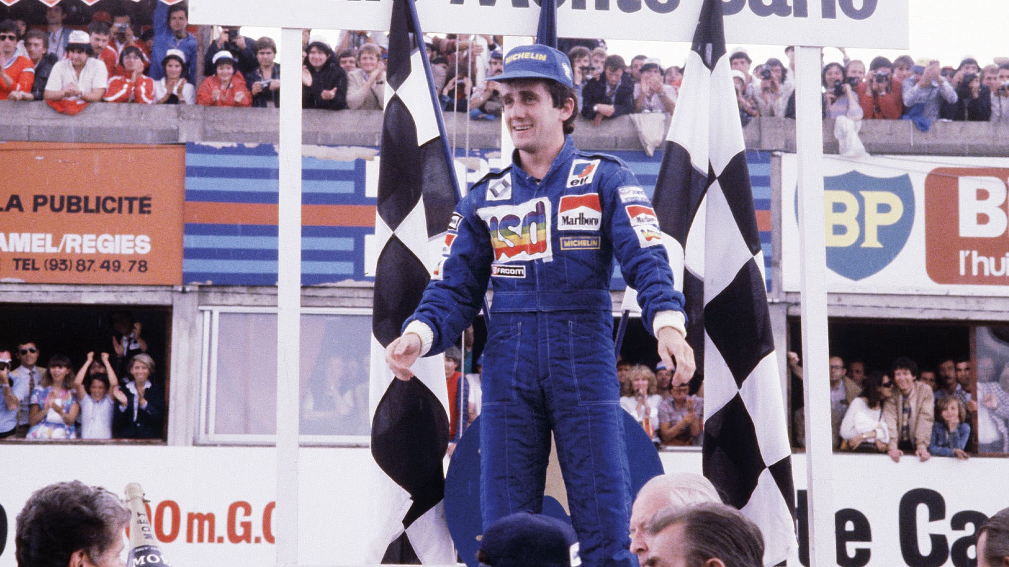 Alain Prost celebrates winning the 1981 French Grand Prix at Paul Ricard for Renault