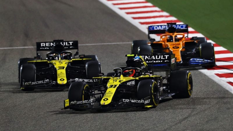 Caros Sainz's McLaren behind the Renaults of Esteban Ocon and Daniel Ricciardo