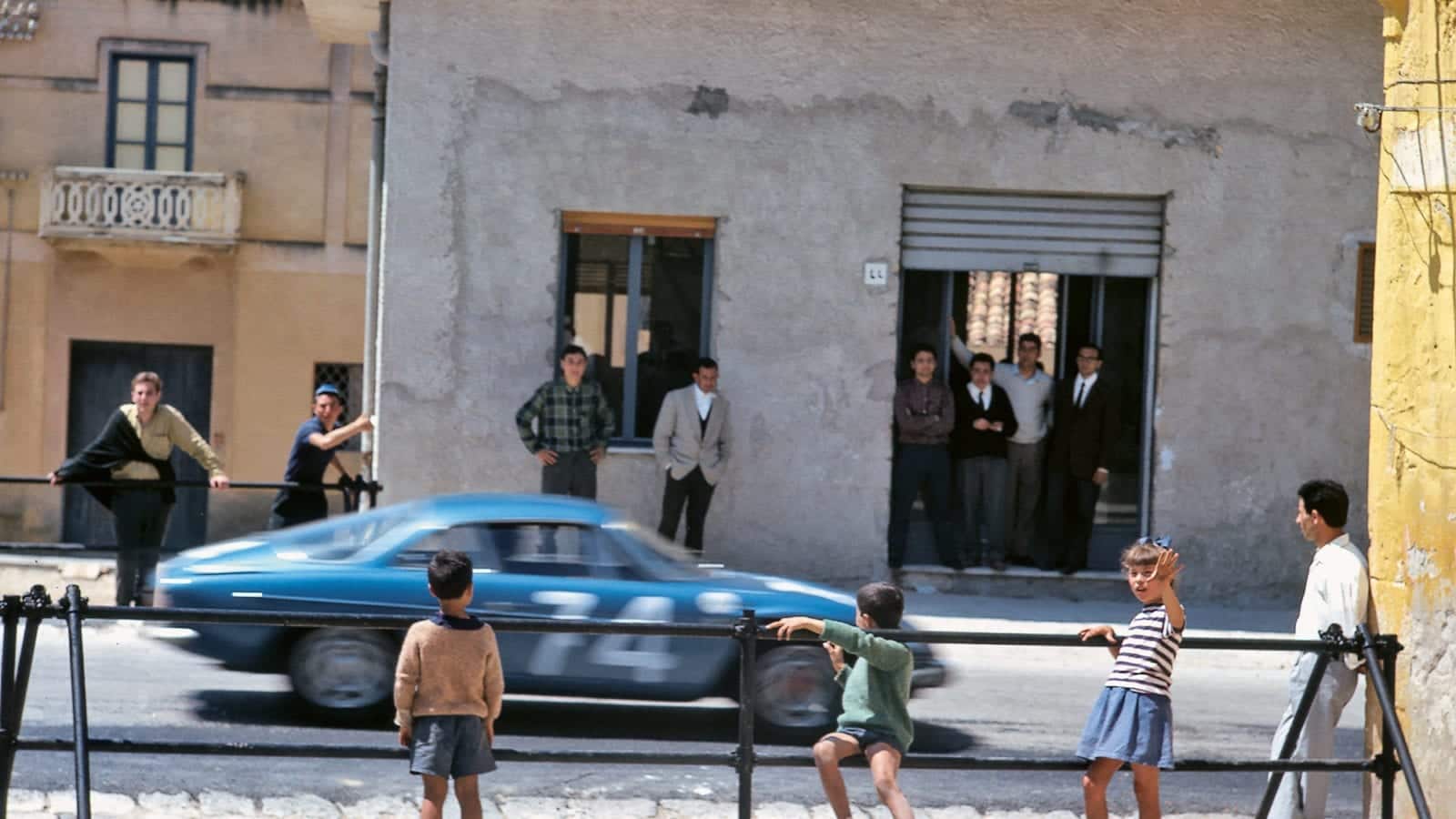 Crowds watch the Alpine A110 of Jean-Pierre Hanrioud and Jean-Francois Piot on the 1966 Targa Florio