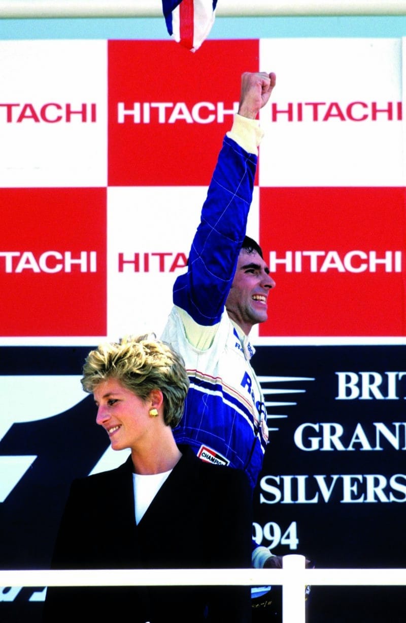 Damon-Hill-celebrates-winning-the-1994-F1-British-Grand-Prix-on-the-SIlverstone-podium-with-Princess-Diana