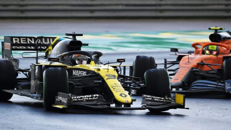 Daniel Ricciardo spins his Renault in front of Lando Norris' McLaren during the 2020 F1 Turkish Grand Prix at Istanbul Park