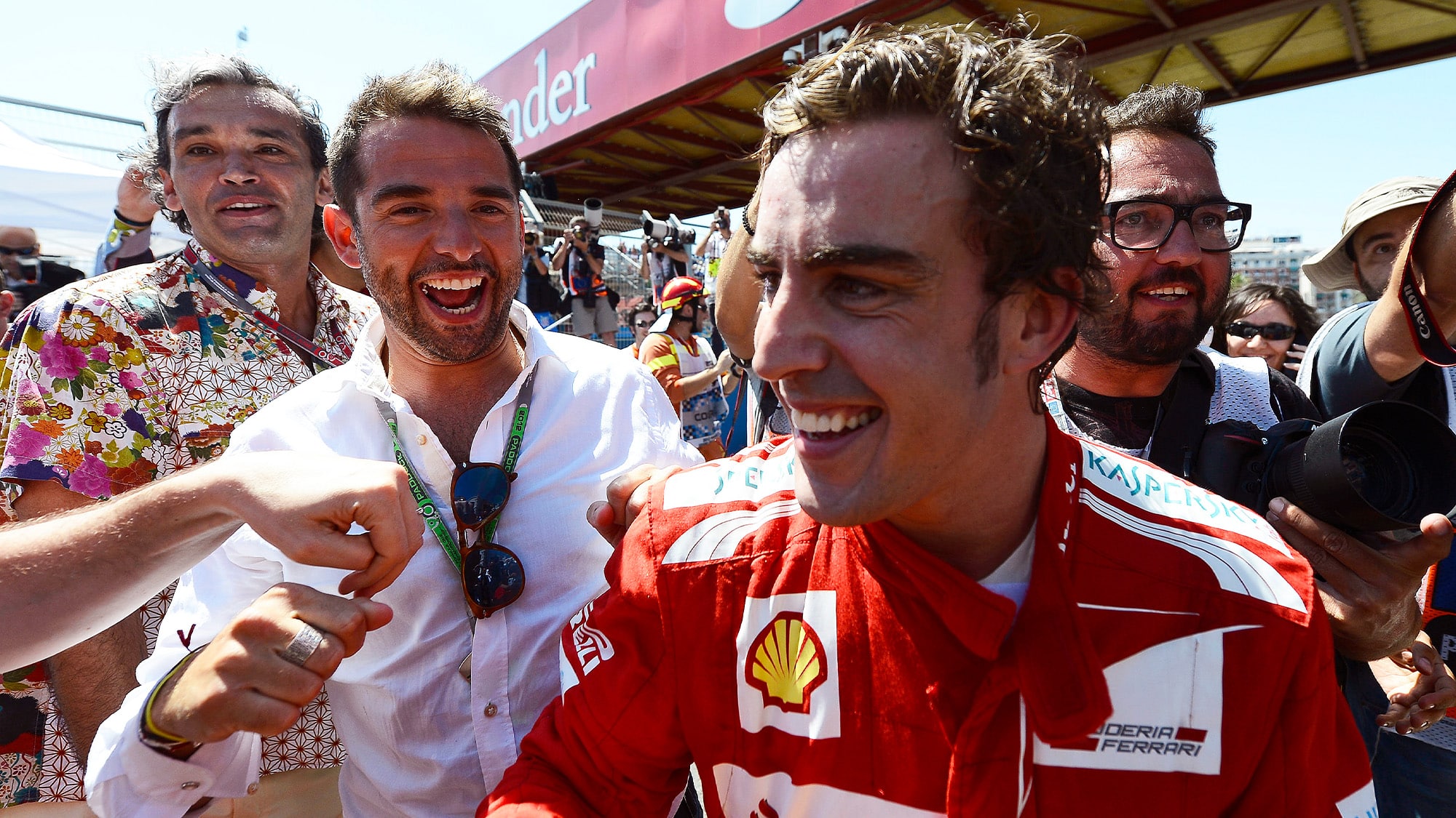 Fernando Alonso celebrates winning the 2012 European GP in Valencia