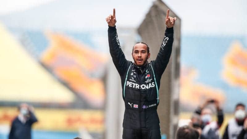 Lewis Hamilton celebrates winning the 2020 F1 Turkish Grand Prix and clinching his seventh world championship