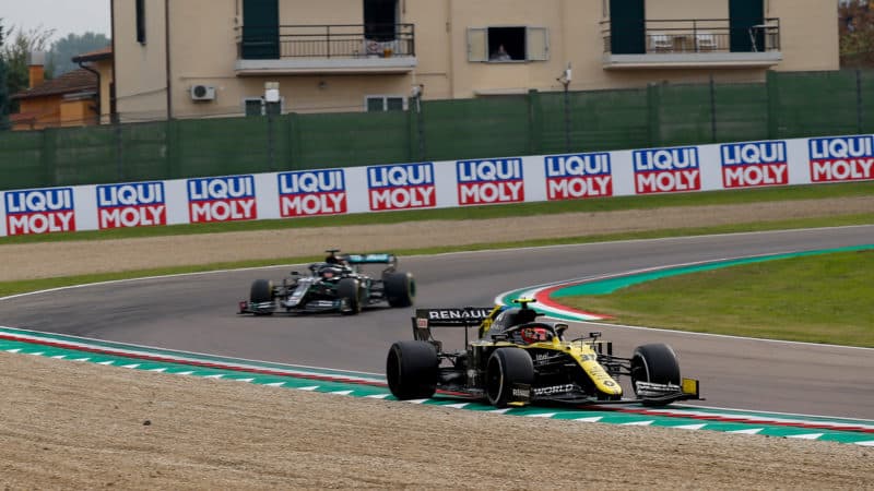 Lewis Hamilton comes up to lap the renault of Esteban Ocon at the 2020 F1 Emilia Romagna Grand Prix