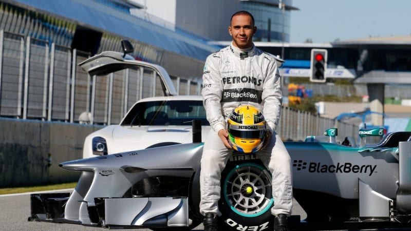 Lewis Hamilton sits on the Mercedes W04 2013 F1 car