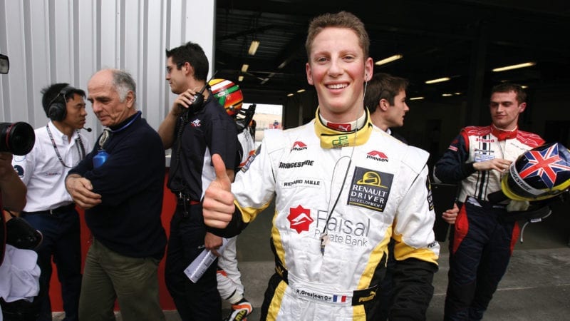 Romain Grosjean gives a thumbs up in the GP2 Asia Series paddock