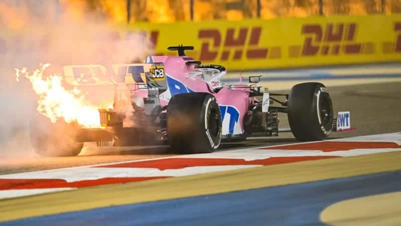 The engine on the Racing Point of Sergio Perez expires in flames at the 2020 F1 Bahrain Grand prix