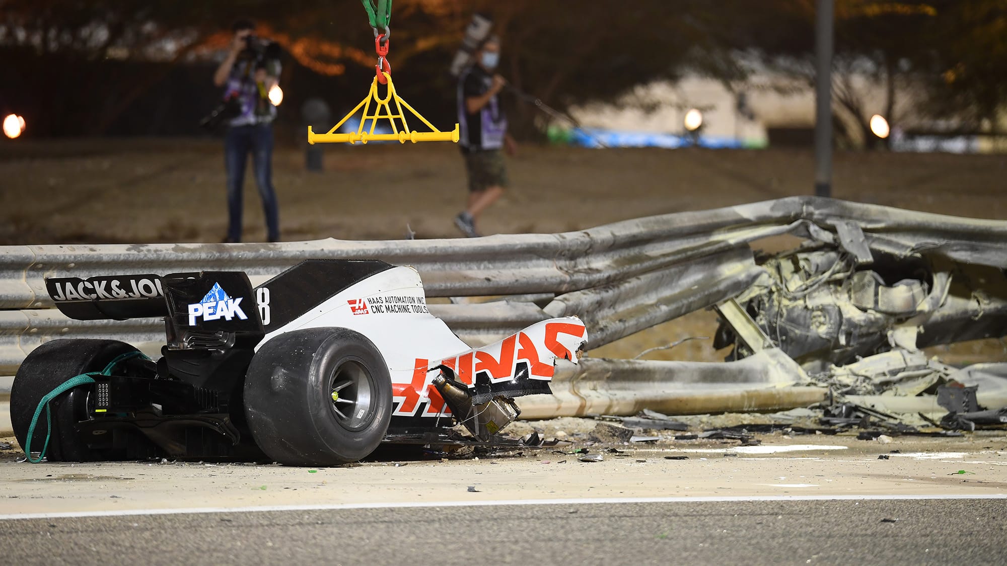 The wreckage of Romain Grosjean's Haas at the 2020 f1 Bahrain Grand prix