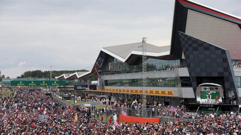 Crowds gather under the pdoum after the 2019 British Grrand Prix