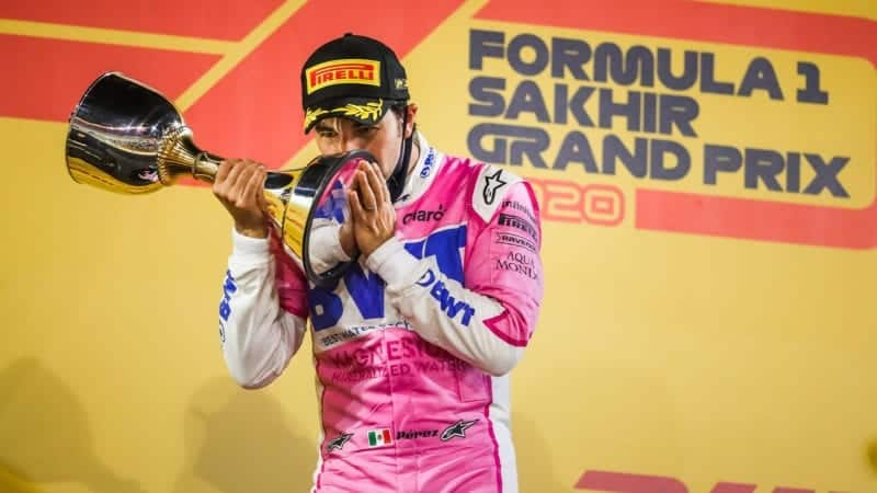 Sergio Perez kisses his trophy after winning the 2020 Sakhir Grand Prix