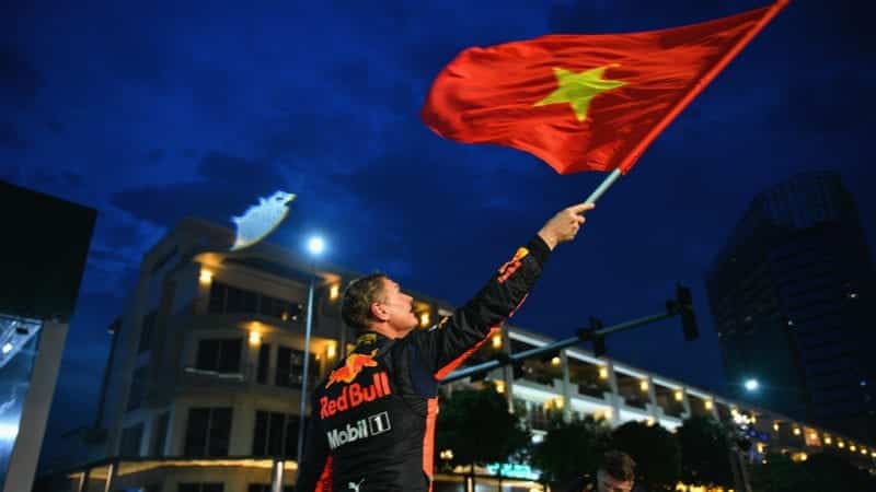 David Coulthard waves the Vietnamese Flag in Ho Chi Minh City