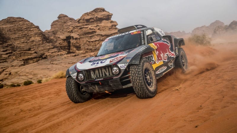 Stephane Peterhansel and Edouard Boulanger in the Mini Buggy of the X-Raid Mini JCW Team races during the 10th stage of the Dakar 2021 between Neom and Al-ʿUla, in Saudi Arabia on January 13, 2021.