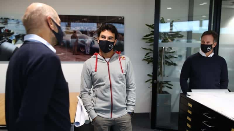 Sergio Perez meets Adrian Newey and Christian Horner at the Red Bull F1 factory in January 2021