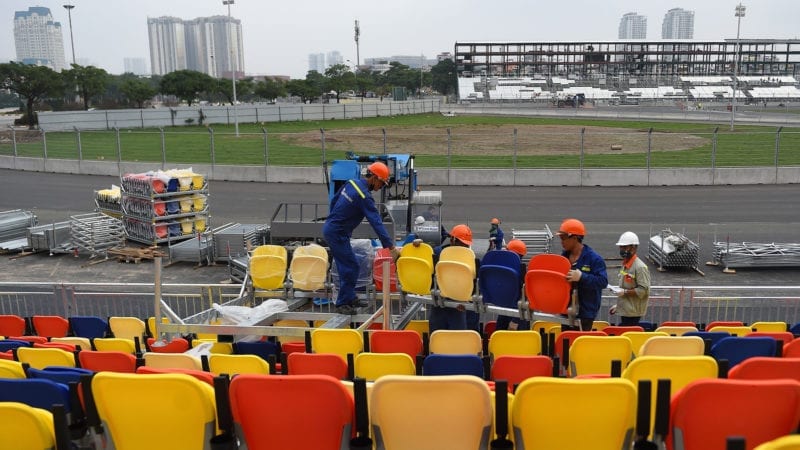 Workers install seats at the Hanoi Street Circuit in Vietnam