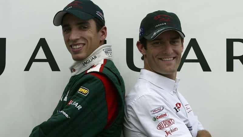 Justin Wilson and Mark Webber pose for a Jaguar F1 team photo in 2003