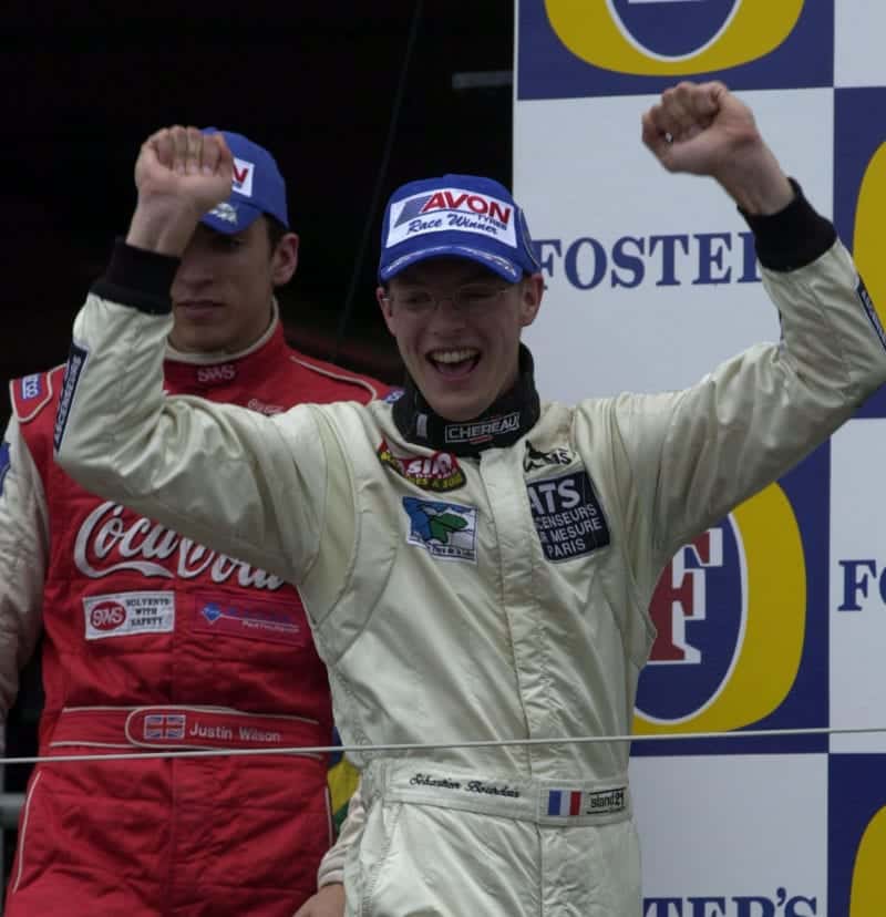Sebastian-Bourdais-and-Justin-WIlson-after-the-2001-F3000-SIlverstone-race