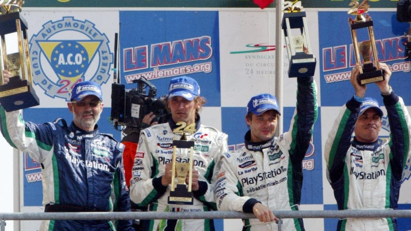 Sebastian Loeb on the podium at Le MAns with Henri Pescarolo and Franck Montagny