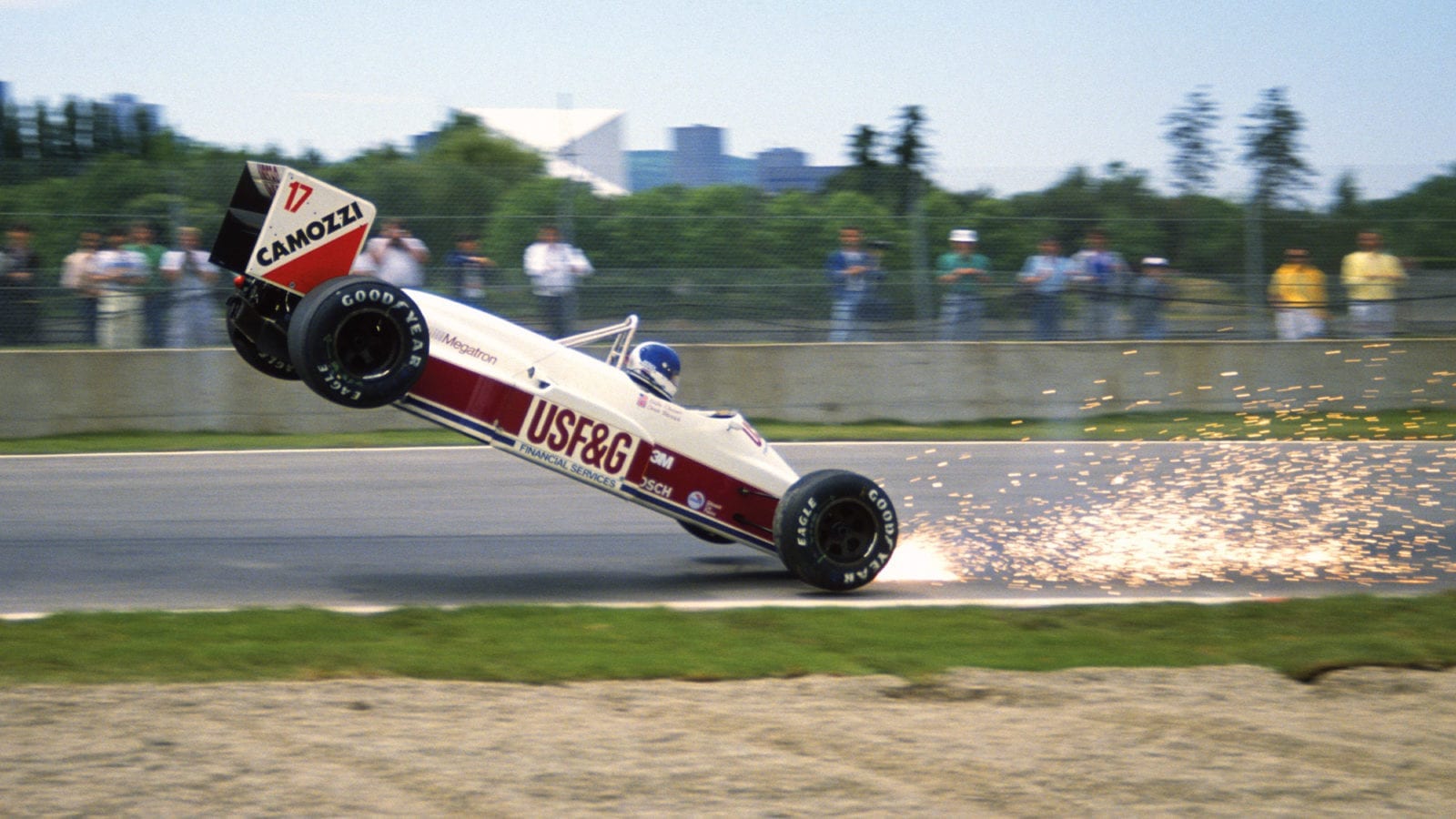 Sparks fly as Derek Warwick crashes his Arrows during practice for the 1988 Canadian Grand Prix