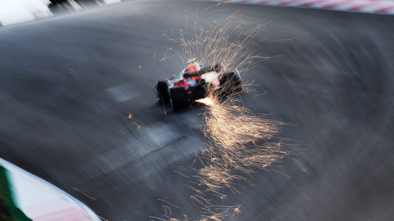 Sparks fly from Red Bull of Alex Albon in 2020