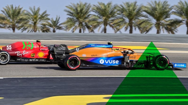 Ferrari's Spanish driver Carlos Sainz Jr (L) and McLaren's British driver Lando Norris vie for position during the third practice session ahead of the Bahrain Formula One Grand Prix at the Bahrain International Circuit in the city of Sakhir on March 27, 2021. (Photo by ANDREJ ISAKOVIC / AFP) (Photo by ANDREJ ISAKOVIC/AFP via Getty Images)