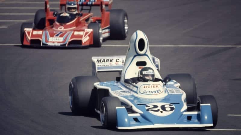 LONG BEACH, CA - MARCH 28: Jacques Lafitte in a Ligier JS5 leads the Alfa-Brabham BT45 of Carlos Reutemann at the first United States Grand Prix West held on March 28, 1976 in Long Beach, California. (Photo by Alvis Upitis/Getty Images)