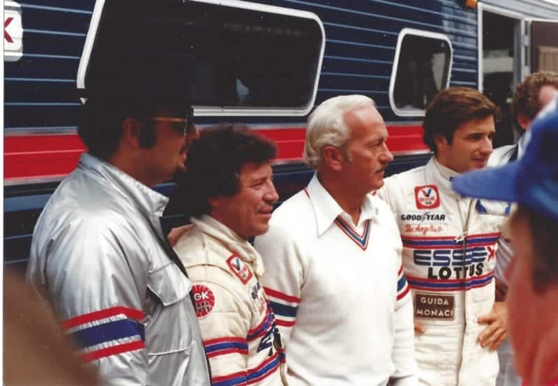 Colin Chapman with Elio de Angelis and Mario Andretti at the 1980 US Grand Prix